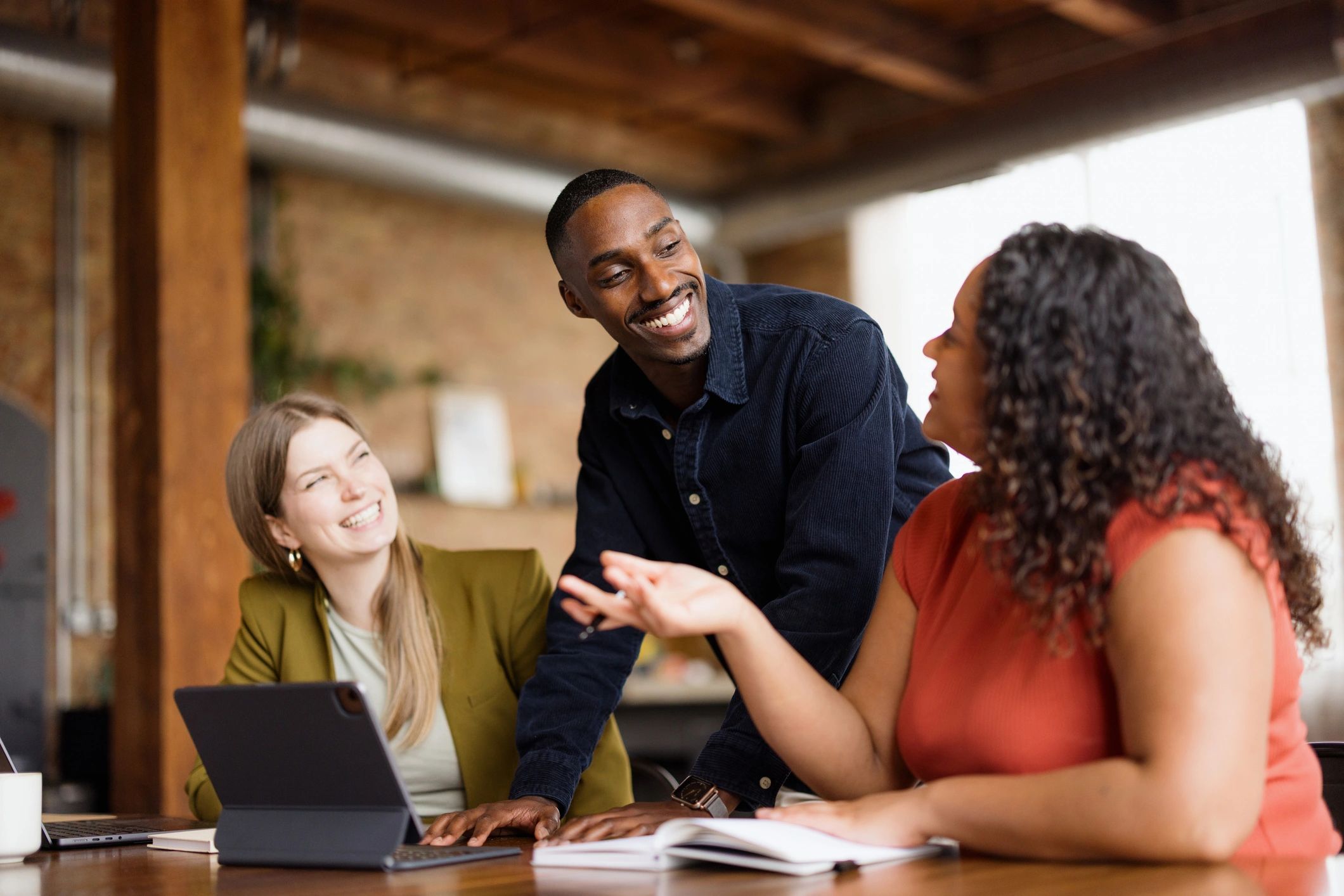 Team members collaborating in a bright office